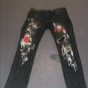 Distressed Black Jeans with Graphic Accents